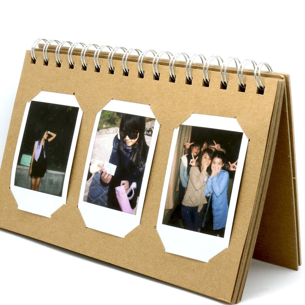 Skip to the beginning of the images gallery Stela Desk Calendar Style Photo Album For Fujifilm Instax Mini 7s 8 25 50s 70 90/ Polaroid Z2300/ Polaroid PIC-300P/ Polaroid Snap Films-