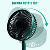 Portable fan with a green frame and black blades on a light blue background, featuring text 'Fan can rotate 180°'.