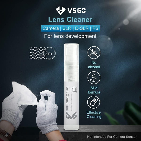 VSEO lens cleaner with a person wearing gloves holding a cloth against a dark background